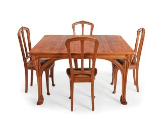 2086
A French Art Nouveau dining table and eight chairs
Circa 1900; Nancy region, France
The table extendable with five associated later leaves, the corners decorated with carved wheat stalk accents, together with eight conforming side chairs with leather seat cushions and brass tacking
14 pieces
Table: 29.5" H x 53" W x 49" D; Each leaf: 15.5" W; Each chair: 39" H x 16.5" W x 18" D
Estimate: $700 - $900
