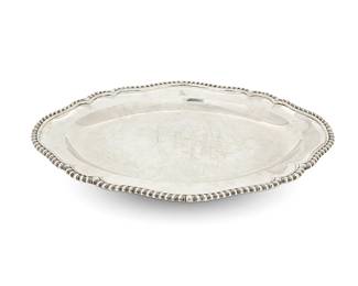 2005
A Victorian sterling silver oval meat platter
1867
With British hallmarks for sterling, London, date, Queen Victoria, and maker: RG [Robert Garrard); impressed: GARRARDS Panton Street LONDON
The oval platter with dished cavetto and gardrooned rim, engraved with crest
1.375" H x 19" W x 14.125" D
68.2 oz. troy approximately
Estimate: $2,000 - $3,000