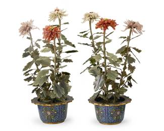 2075
A pair of Chinese carved hardstone trees
20th century
Each decorated with carved translucent hardstone peony flowers and stone leaves, affixed to woven fabric-encased and pliable branches, stemming from a painted plaster trunk, set in a weighted cloisonné pot
2 pieces
Each: 26.5" H x 16" Dia. approximately, dimensions variable
Estimate: $300 - $500