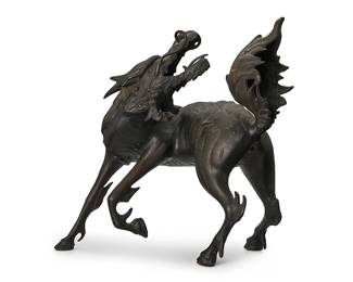 2201
An East Asian bronze Kirin figure
20th century
Likely Japanese
12.25" H x 11.5" W x 7.5" D
Estimate: $800 - $1,200