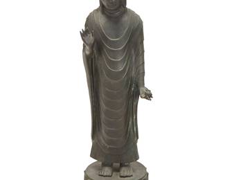 2343
A Japanese bronze figure of Amida Nyorai
20th century
Depicted in flowing robes and hands displaying itarka mudra, standing atop a double lotus base
34.5" H x 11.5" W x 11.5" D
Estimate: $400 - $600