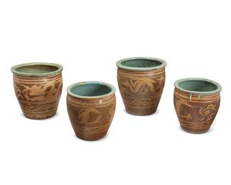 2184
A group of Asian ceramic jardinières
19th century or later; China or Southeast Asia
Each ovoid jardinière depicting a dragon figure in ochre and brown glazes, with a teal glazed interior
4 pieces
Largest: 19.25" H x 20" Dia.; Smallest: 16" H x 16" Dia.
Estimate: $600 - $800