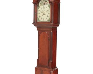 2413
A George III mahogany tall case clock
18th/19th century
The two-movement clock with Roman numeral inner hour and Arabic minute marker outer track on an enameled metal dial, with subsidiary seconds dial and crescent date dial, all below a day/night moon phase dial, housed in a mahogany case with a hinged cabinet door centering fluted columnar accents, surmounted by a glazed bonnet with a broken swan neck pediment
89" H x 19.75" W x 11" D
Estimate: $1,500 - $2,500