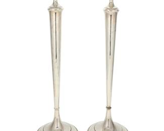 2012
A pair of weighted sterling silver candlesticks
20th century
Each marked to underside: Sterling / R44
The footed candlesticks, each with attenuated standard
2 pieces
Each: 20.25" H x 5.75" Dia.
Estimate: $300 - $500