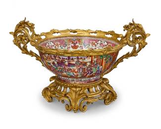 2262
A Rococo-style gilt-bronze-mounted Chinese Export porcelain bowl
Late 19th/early 20th century
The Rose Medallion porcelain bowl decorated with figural scenes, mounted with Louis XV-style bronze foliate and scrolled accents and set on an openwork base
11.625" H x 19.5" W x 13.25" D
Estimate: $1,000 - $1,500