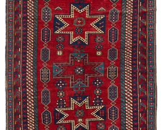 2033
A star Kazak rug
Early 20th century
Wool on wool foundation
7' 6" L x 5' 7" W
Estimate: $300 - $500