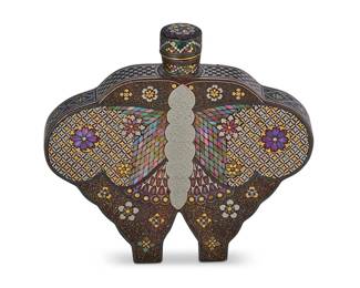 2164
A lac burgauté butterfly-form snuff bottle
Late 19th/early 20th century
Likely Japanese, decorated with inlaid mother of pearl and lacquer
2.75" H x 3" W
Estimate: $800 - $1,200