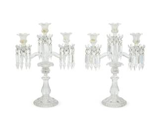 2422
A pair of Baccarat 'Medallion' candelabra
Late 20th century
Each with Baccarat factory stencil mark
Each three-light candelabrum with floriform nozzles and bobèches mounted with faceted prisms, raised on a lobed foot with beaded edge
2 pieces
Each: 17.75" H x 13" W x 5.375" D
Estimate: $800 - $1,200