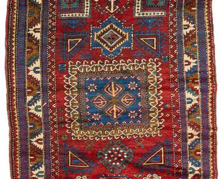 2453
A Caucasian prayer rug
Early 20th century
Wool on cotton foundation
7' 4" L x 4' 3" W
Estimate: $500 - $700