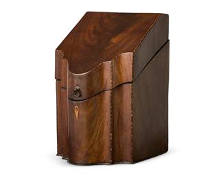 2400
A George III inlaid mahogany knife box
Early 19th century
The mahogany veneer lidded box with locking mechanism, featuring inlaid trim, opening to reveal thirty-eight slots
14.25" H x 8.875" W x 10.75" D
Estimate: $300 - $500