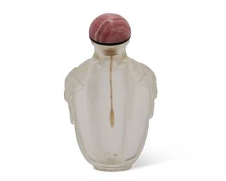 2144
A Chinese carved rock crystal snuff bottle
Late 19th century
With opposed masks in low relief
3.625" H
Estimate: $300 - $500