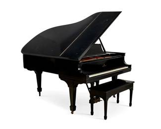 2430
A Steinway & Sons baby grand piano
Circa 1925
Marked to fallboard: [lyre logo] / Steinway & Sons; inscribed in ink to keyboard wood: 234939
The 88-key piano housed in an ebonized wood case with square tapering legs ending in spade feet on casters, together with a bench with flip-top for sheet music storage
2 pieces
Piano: 40" H x 75" W x 58" D approximately; Bench: 19.625" H x 36" W x 15" D
Estimate: $4,000 - $6,000