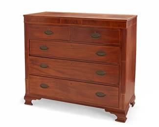 2386
A George III-style mahogany chest of drawers
20th century
The wood chest with brass hardware and brass pulls, featuring five drawers centering fluted vertical panels, raised on ogee bracket feet
42.25" H x 47" W x 22" D
Estimate: $500 - $700