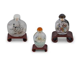 2170
Three Chinese reverse-painted glass snuff bottles
20th century
Each bearing Chinese inscriptions
Two depicting maidens and one depicting a cat, each mounted on a wood stand
3 pieces
Tallest without stand: 3" H
Estimate: $300 - $500