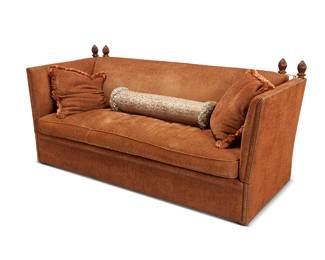 2425
An Edward Ferrell 'Knole' sofa
Early 21st century
Marked under middle cushion: Edward Ferrell LTD
The sofa with hinged side panels, which anchor with a tasseled cord bound around wood finials, upholstered in a burnt orange chenille fabric, with two conforming pillows and an associated bolster pillow
4 pieces
Stored: 40.5" H x 86" W x 39" D; Open: 126" W
Estimate: $800 - $1,200