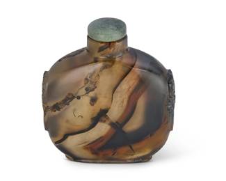 2151
A Chinese carved agate snuff bottle
Mid-19th century
The banded agate with carved accents to each side
2.875" H
Estimate: $300 - $500