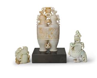 2330
Three Chinese archaistic carved hardstone items
20th century
Comprising a double vase covered urn set on a black stone base, a covered vase on the back of a phoenix, and another carving of a phoenix seated on a vase
3 pieces
Largest overall: 11" H x 6" W x 2.5" D; Smallest: 3.875" H x 3.5" W x 1.625" D
Estimate: $1,200 - $1,800