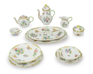 2423
A Herend porcelain 'Queen Victoria' part dinner service
Mid/late 20th century
Underglaze blue factory marks, impressed and inscribed blue numbers
Comprising 6 dinner plates (10.125"), 8 salad plates (8"), 6 soup plates (9.5"), six fruit bowls, two oval platters (13.5" and 15"), a ladle, four cups, a coffee pot, a teapot, a covered sugar bowl, and a creamer
37 pieces
Estimate: $1,200 - $1,800