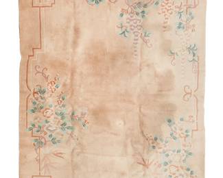 2445
A Chinese carpet
20th century
Wool on cotton foundation with light pink and purple flowering vines around a band work border on a champagne field
10' 1.5" L x 8' W
Estimate: $400 - $600