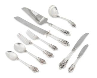2024
A Wallace sterling silver 'Grand Baroque' flatware service
Mid/late 20th century
Each marked for Wallace and for sterling
Designed 1941, comprising 12 dinner knives (9"), 6 butter spreaders (6.25"), 12 dinner forks (7.5"), 6.625"), 12 salad forks (6.625"), 12 cream soup spoons (6.25"), 12 teaspoons (6.25"), 1 gravy/sauce ladle (6.5"), 1 pie/cake server (11.25"), and 1 bread slicer (12.875")
69 pieces
Weighable sterling: 76.2 oz. troy approximately
Estimate: $1,500 - $2,000