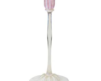 2094
A Tiffany Studios Pastel Favrile glass candlestick
Early 20th century
Etched to underside: 1910 / L. C. T. Favrile
The hand-blown glass footed candlestick with floriform bobèche
10.25" H x 4.5" Dia.
Estimate: $700 - $900