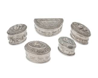 2289
A group of Burmese sterling silver boxes
Late 19th/early 20th century
Two marked in Burmese to the underside
Each with elaborate chased and repoussé foliate and figural motifs, comprising four oval boxes and one semicircle
5 pieces
Largest: 1.25" H x 4" W x 2.25" D; Smallest: 1.75" H x 2.375" W x 1.5" D
Total weight: 14.6 oz. troy approximately
Estimate: $300 - $500