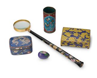 2058
A group of Chinese cloisonné desk items
20th century
Hinged box marked to underside: China
The enameled metal items, comprising a long-handled magnifying glass with floral motifs, a hinged lid box depicting blue flowers revealing four internal compartments, a rectangular blue ground lidded box depicting dragon and phoenix motifs and revealing a fabric-lined interior, a pencil cup with blue panels depicting butterflies and floral motifs, and an egg depicting floral motifs
5 pieces
Largest box: 1.875" H x 6.125" W x 4.75" D; Magnifying glass: 20.25" L; Egg: 2.25" H x 1.75" Dia.
Estimate: $300 - $500
