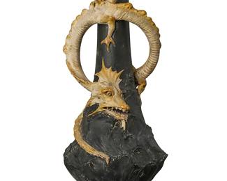 2084
A Johann Maresch earthenware figural dragon vase
Circa 1900
Impressed to underside: JMB / 1673
The painted vase with molded dragon figure in high relief
16.5" H x 7.125" Dia.
Estimate: $800 - $1,200