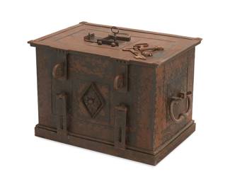 2379
A Renaissance-style iron chest
19th century
The chest with opposed handles to side and floral medallion to front, the lid with double latch lock and central door-form lock, opening to reveal a painted panel depicting floral motifs, with 4 keys
20" H x 29.5" W x 21" D
Estimate: $700 - $900