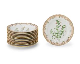 2433
A set of twelve Royal Copenhagen porcelain 'Flora Danica' dinner plates
1969-1973
Each variously marked in script for the depicted botanical and further marked: Royal Copenhagen [most with dot under 'G'] / [crown logo] / Denmark / 20 / 3549; each marked with three waves in blue underglaze
Designed 1790, the plates with painted and gilt-embellished sawtooth rim, each variously featuring a central hand-painted depiction of a botanical
12 pieces
Each: 10.25" Dia.
Estimate: $6,000 - $8,000