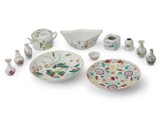 2177
A group of Chinese Qianjiangcai and other porcelain vessels
Late Qing Dynasty (1644-1912)
One plate bearing a reign mark in red underglaze to underside; bowl marked in Chinese characters to underside
Each decorated with variations of floral, figural, peach, and bat motifs, comprising two plates, a crescent bowl, a teapot, an open box, an ink well, a diminutive bowl, and five bud vases
12 pieces
Largest plate: 1.875" H x 9.375" Dia.; Smallest (bowl): 1.125" H x 2.25" Dia.
Estimate: $1,000 - $1,500