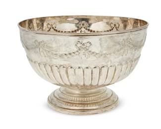 2004
A Victorian sterling silver punch bowl
1890
Marked for sterling, for London, date, and maker: WBJ [Walter & John Barnard]
The footed bowl with gadrooned body and repoussé swags of garlands with ribbons
7.5" H x 12" Dia.
35.72 oz. troy approximately
Estimate: $900 - $1,200