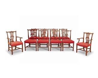 2271
A set of ten Chippendale-style dining chairs
Circa 1930s
Comprising eight side chairs and two armchairs, each with an openwork back splat and ribbon crest rail above a damask-style fabric upholstered seat cushion, raised on squared legs joined by a box stretcher
10 pieces
Each side chair: 37.25" H x 21.5" W x 21" D; Each armchair: 38.5" H x 26" W x 21" D
Estimate: $1,000 - $2,000