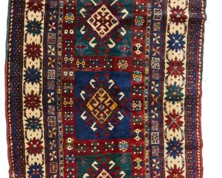2456
A Caucasian geometric runner
Early 20th century
Wool on wool foundation
9' 1" L x 3' 11.5" W
Estimate: $500 - $700