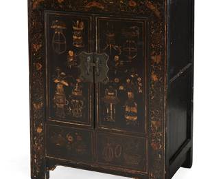 2327
A Chinese gilt and lacquered wood cabinet
Late 19th/early 20th century
The black lacquered wood cabinet with gilt-decorated child figures, housewares, butterfly, and foliate motifs, featuring two locking doors revealing a central drawer between upper and lower open cavities
35.5" H x 25" W x 17" D
Estimate: $400 - $600