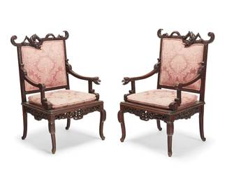 2173
A pair of Chinese Export carved hardwood dragon armchairs
Early 19th century or later
Each featuring a dragon form to crest rail, a dragon head to one armrest terminal, and an elaborate openwork apron under each seat, upholstered in a damask fabric depicting floral motifs with double piping
2 pieces
Each: 44.75" H x 28.25" W x 27.5" D
Estimate: $800 - $1,200