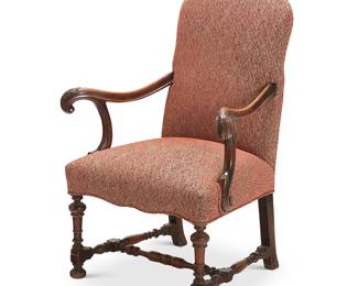2381
A Baroque-style carved wood open armchair
20th century
With curvilinear arms and acanthus-form terminals, upholstered in a woven fabric, raised on block-turned front legs and H-stretcher
47" H x 31.5" W x 27" D
Estimate: $300 - $500