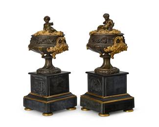2260
A pair of Grand Tour bronze and stone cassolettes
19th century
The parcel-gilt-bronze footed urns, each with opposed mask handles to body and putto finial to lid, one depicted with bow and arrow, the other holding a cup, each mounted on a footed tiered stone pedestal base with gilt edges
2 pieces
Each: 14.75" H x 7.375" W x 6.25" D
Estimate: $2,000 - $3,000