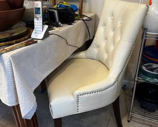 2 Beautiful white leather chairs