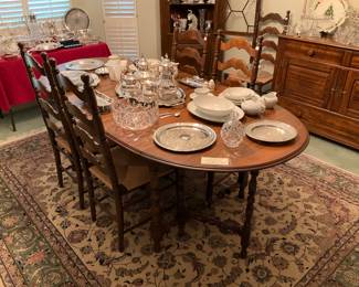 Antique drop leaf gate leg dining table with three additional leaves (all in table in picture). Full size is 41” W x 85” L.