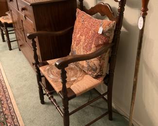 This is the one arm chair in the set of antique ladder back dining room chairs. There are five side chairs. Great condition.