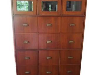 Butlers Secretary Desk With Concealed Desktop, Glass Front Upper Cupboard, Storage Cubbies, & Bracket Feet