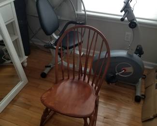 Rocking chair; exercise bike; compass decor