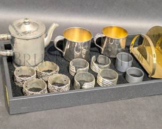 SILVERPLATE TEA CUPS, NAPKIN RINGS AND MINI TEAPOT