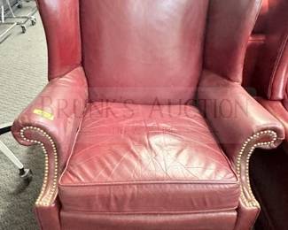RED WINGBACK CHAIR WITH NAILHEAD TRIM