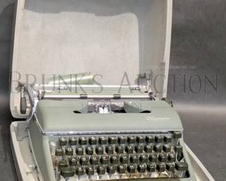 OLYMPIA TYPEWRITTER IN CASE