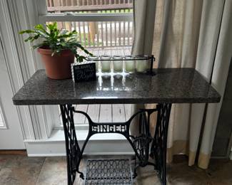 vintage Singer sewing machine table with stone top
