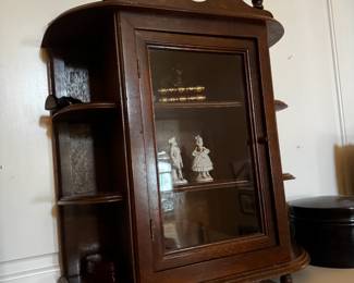 small vintage curio cabinet with glass door