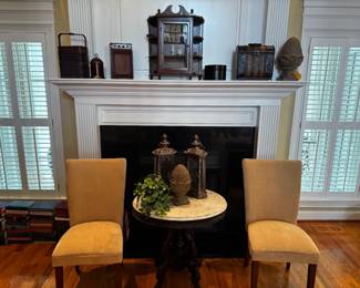 small vintage curio cabinet, dining room chairs, accent table and home decor