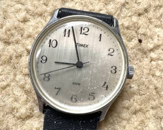 Vintage Timex Mechanical Wristwatch – Silver Dial with Arabic Numerals & Black Strap